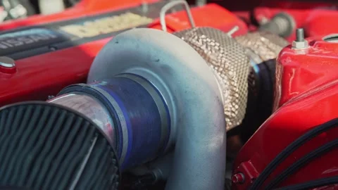 Close up view of a large custom car engine turbocharger. Stock Footage 342442529
