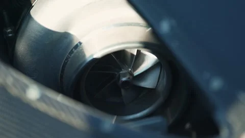 Close up view of a large custom car engine turbocharger. Stock Footage 342443203