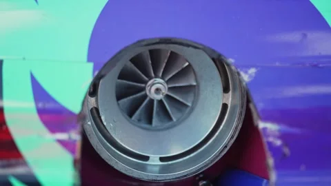 Close up view of a large racing car turbocharger compressor. Stock Footage 342442108