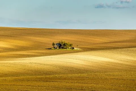 A close-up view of the large screws securing the train tracks during a sunny  Stock-Fotos