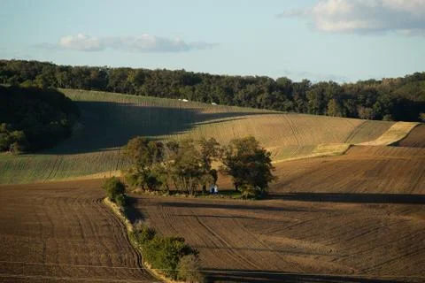 A close-up view of the large screws securing the train tracks during a sunny  Stock-Fotos