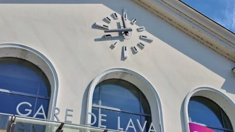 Close-up view of the Laval railway station clock and entrance architecture in Stock Footage 309258877
