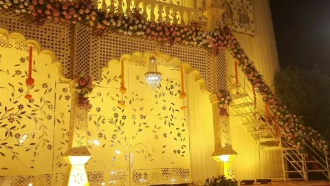 Close Up View of Lavish Wedding Venue Pillars and Floral Staircase at Night 스톡 동영상 334442439