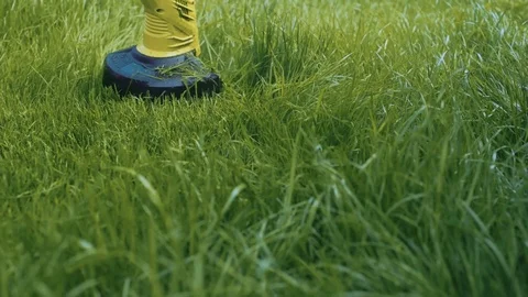 Close up view of lawm mover cutting the grass Stock Footage 107793005