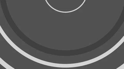 Close up view of layered circular shapes in varying shades of gray with soft  库存插图