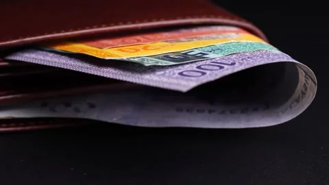 Close up view of leather wallet with Malaysian ringgit (MYR) banknotes. Stock Footage 304250292