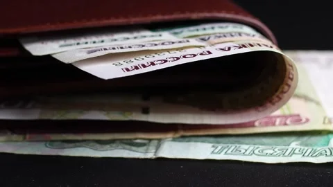Close up view of leather wallet with Russian ruble (RUB) banknotes. Stock Footage 304250228
