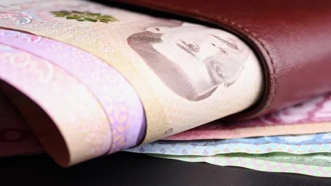 Close up view of leather wallet with Thai baht (THB) banknotes. Stock Footage 304250281