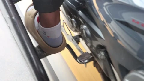 Close-up view of the leg of a motorcycle driver with a sidecar Stock Footage 307978262