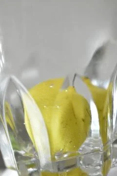 Close up view of lemon with water. Stock Photos