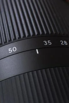 Close-up view on lens of digital camera. Stock Photos