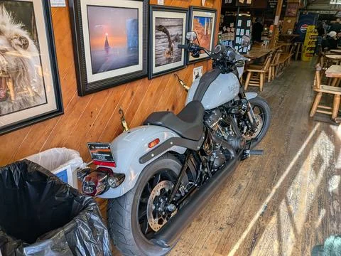 Close view of light blue and black Harley-Davidson motorcycle Stock Photos