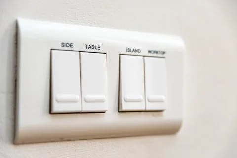 Close up view light switches with name Table on it Stock Photos