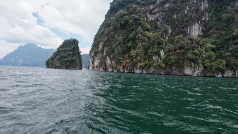 Close View of Limestone Cliff Along Cheow Lan Lake Stock Footage 329073246
