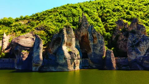 Close view of limestone rock pillars above river, Bulgaria Video stock 344690663