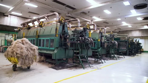 Close view of the loom conveyors with wool in production. Stock Footage 136706384