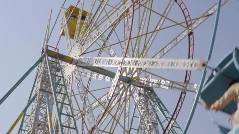 A close-up view from a low angle showcasing the thrilling ride of a roller Stock Footage 300541068