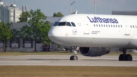 Close up view of a Lufthansa passenger airplane departure Stock Footage 249679408