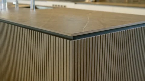 Close up view of luxurious kitchen counter with blurred background. Focused on Stock Footage 276374062