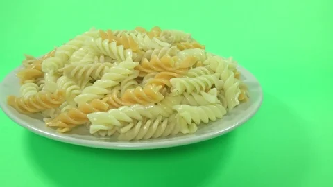 Close-Up View Of Macaroni or pasta With Green Background Vidéo 92614377
