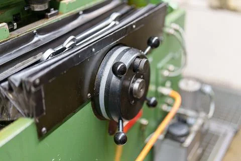 Close view of machine part showing controls and mechanisms in a workshop du.. 스톡 사진