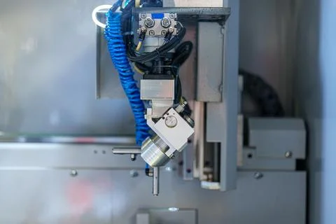 Close view of a machine tool during operation in a workshop setting focusin.. 스톡 사진
