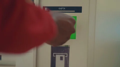 Close up view of male hand inserting card into cash machine. Human and Stock Footage 111220685