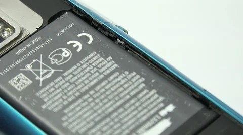 Close-up View of Male Hand Installing Lithium-ion Battery into the Smart Phone Stock Footage 48847857