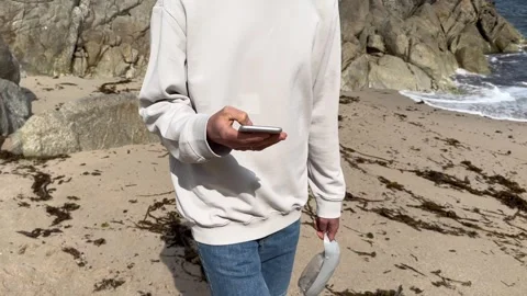 Close up view of male hands using smartphone scrolling, browsing, surfing Stock Footage 241995601