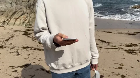 Close up view of male hands using smartphone scrolling, browsing, surfing Stock Footage 242084853