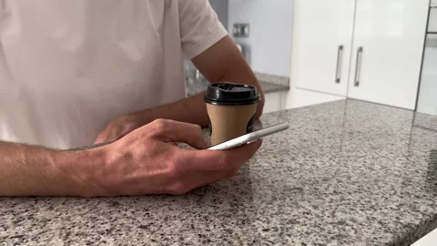 Close up view of male hands using smartphone scrolling, browsing, surfing Stock Footage 242487362