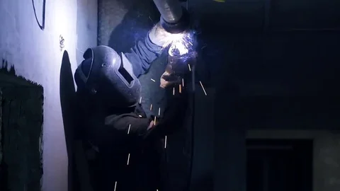 Close up view of male welding pipe sections together Stock-Footage 69814073