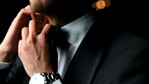 Close up view of man adjusts his suit. Slow motion Vidéo 163503539