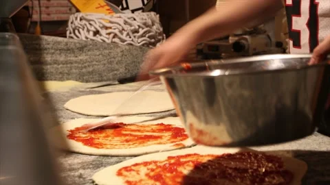 Close up view of a man chef cooking italian pizza. The process of making pizza a Video stock 139941652