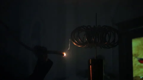 Close up view of man creating lightning inside room Stock Footage 67758370