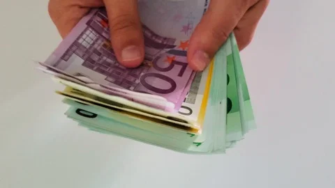 Close up view of man hand counting euro money bills - european currency, mone Stock Footage 129510484