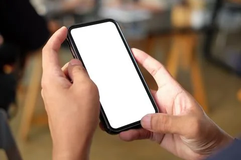 Close up view of man hands holding smart phone with empty display. Foto stock