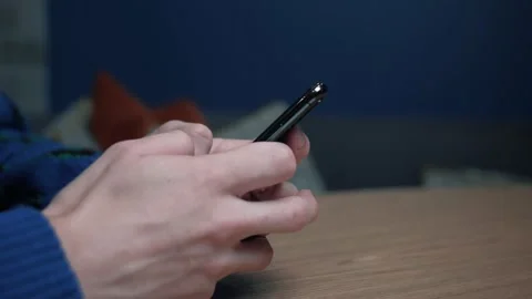Close up view of man hands uses phone texting message, browsing surfing internet Video stock 144629380