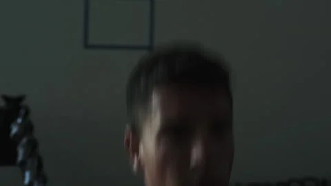 Close view of man performing heavy weight lifting in dark gym setting Stock Footage 312715469