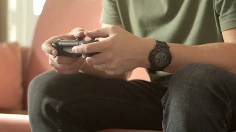 Close-up view of man playing in a console game Stock Footage 144362145