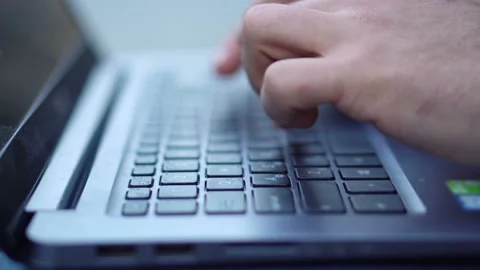 Close-up View of Man Using Laptop in the city street. 4K Video Clip Stock Footage 97850283