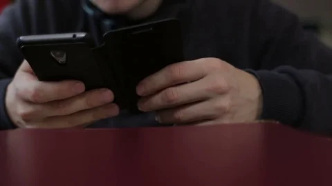 Close up view of man using smart phone Stock Footage 73756290