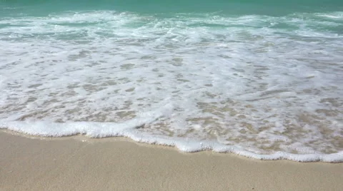 Close-up View of Man Walking on Tropical Beach Sea Waves Stock Footage 59069597