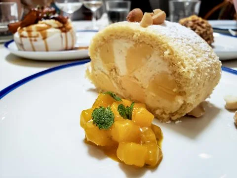 Close-up view of Mango Ice Cream Log served on a plate as dessert Stock Photos