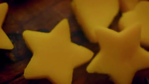 Close-up view of mango slices cut into stars and hearts Stock Footage 331635010
