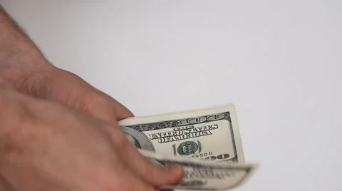 Close up view of man’s hands count hundred dollar bills Stock Footage 60624056