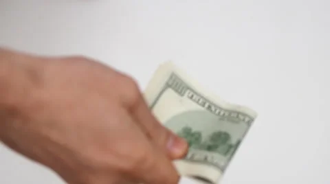 Close up view of man’s hands count hundred dollar bills and give some money away Video stock 60624404