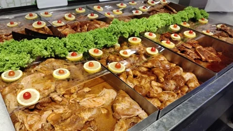 Close-up view of the marinated meat on the ice selling in the supermarket. 動画素材 196299950