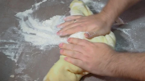 Close up view of married baker s hands kneading dough Stock Footage 124365155