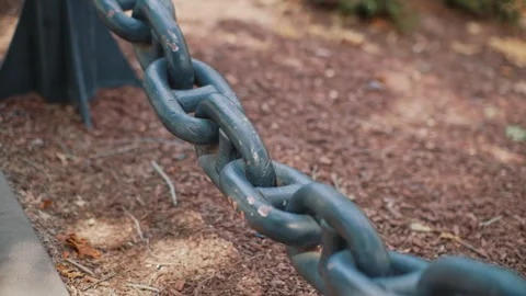 Close up view of massive metal chain in park Stock Footage 341110000